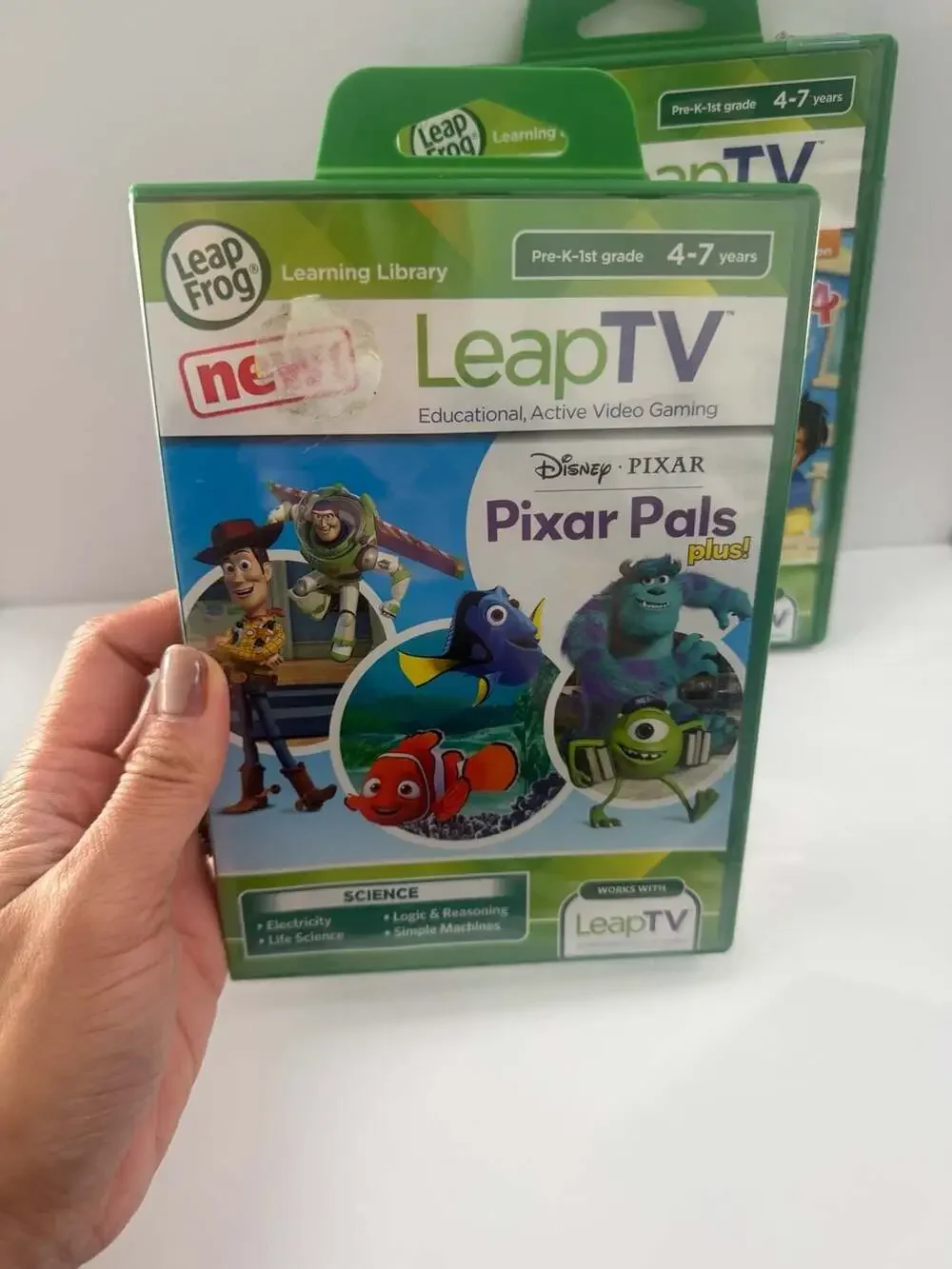 LeapFrog LeapTV Learning Video Games Lot: Pixar Pals Plus! and Dora and Friends